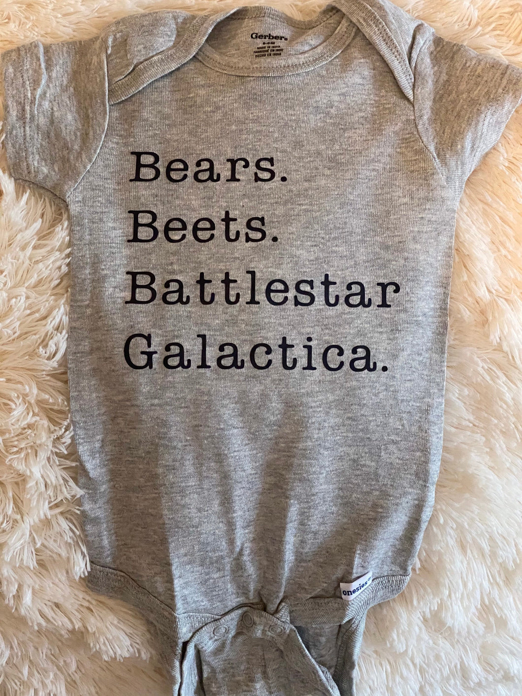 Bears. Beets. Battlestar Galactica. onesie